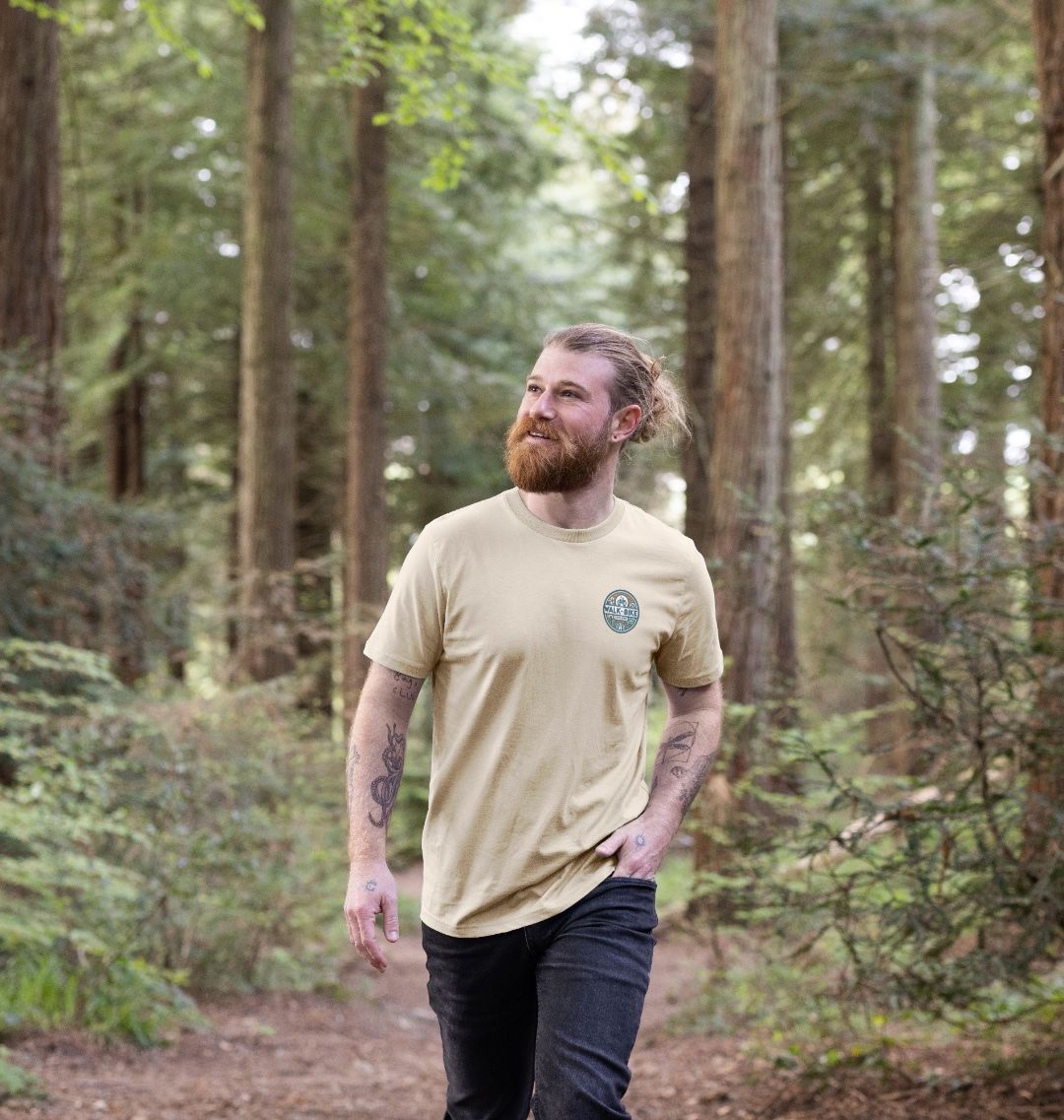 Beige t-shirt with circular logo (person)