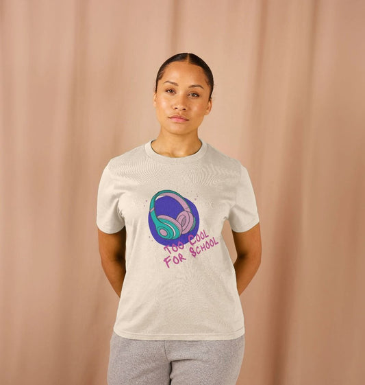 White t-shirt with "Too Cool For School" text and headphones graphic (person)