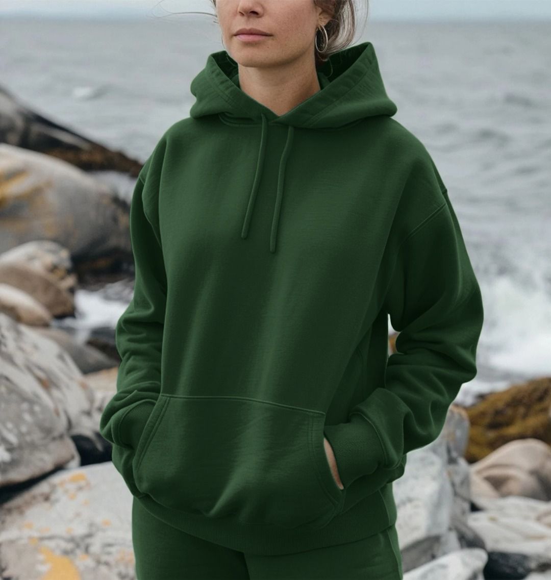 Green hoodie with drawstrings and pockets (person)