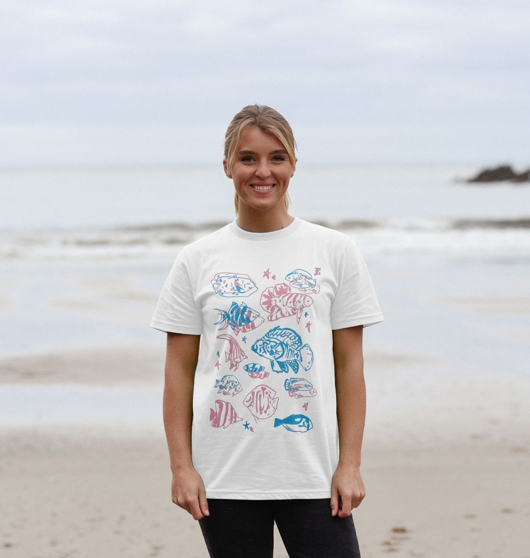 White t-shirt with colorful fish designs (person)