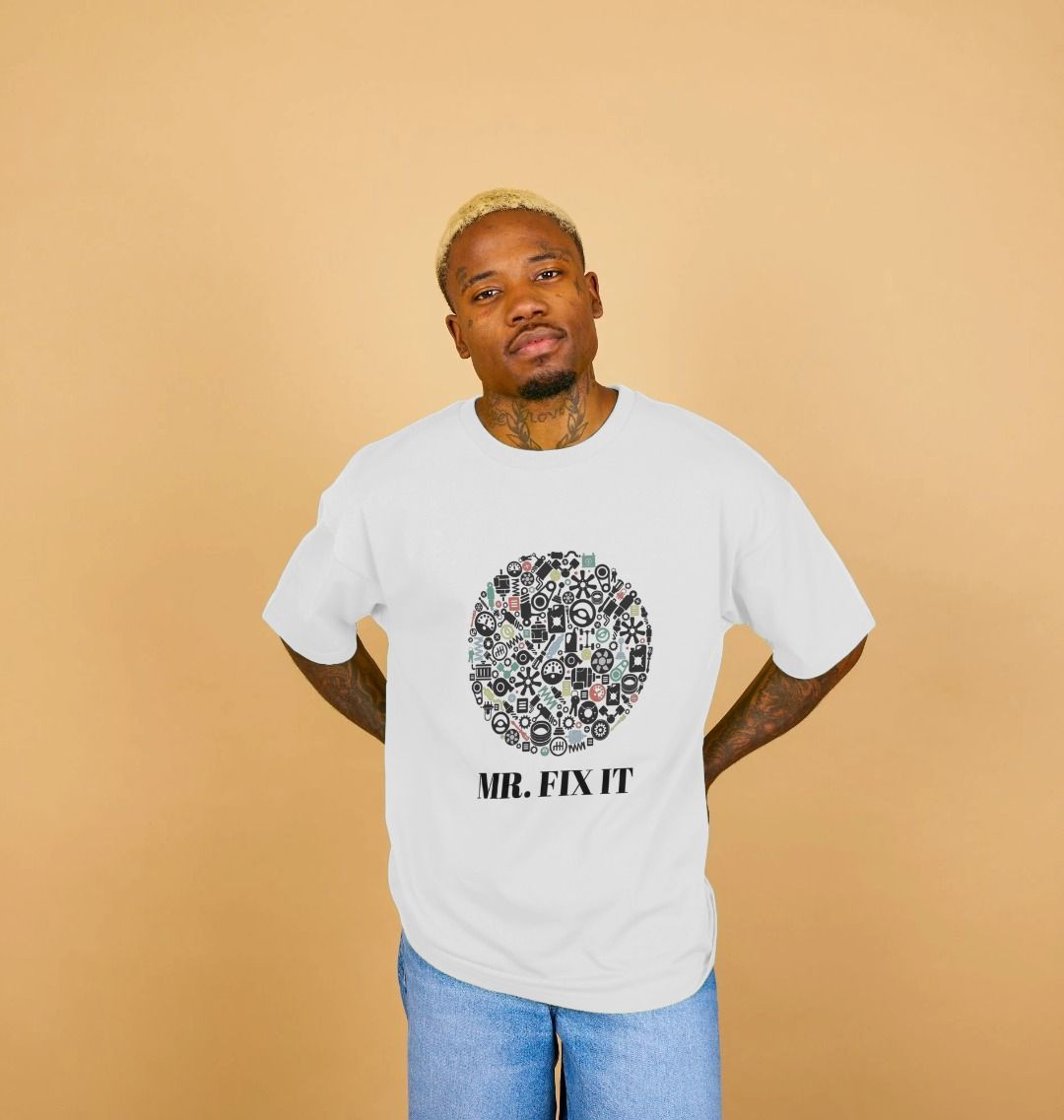 White t-shirt with "Mr. Fix It" text and gear design (person)