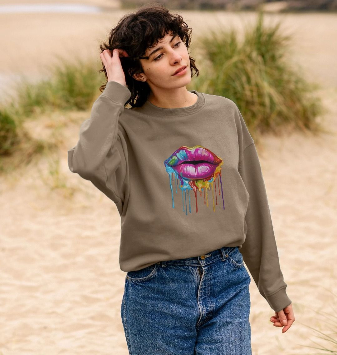 Olive green sweatshirt with colorful dripping lips design (person)