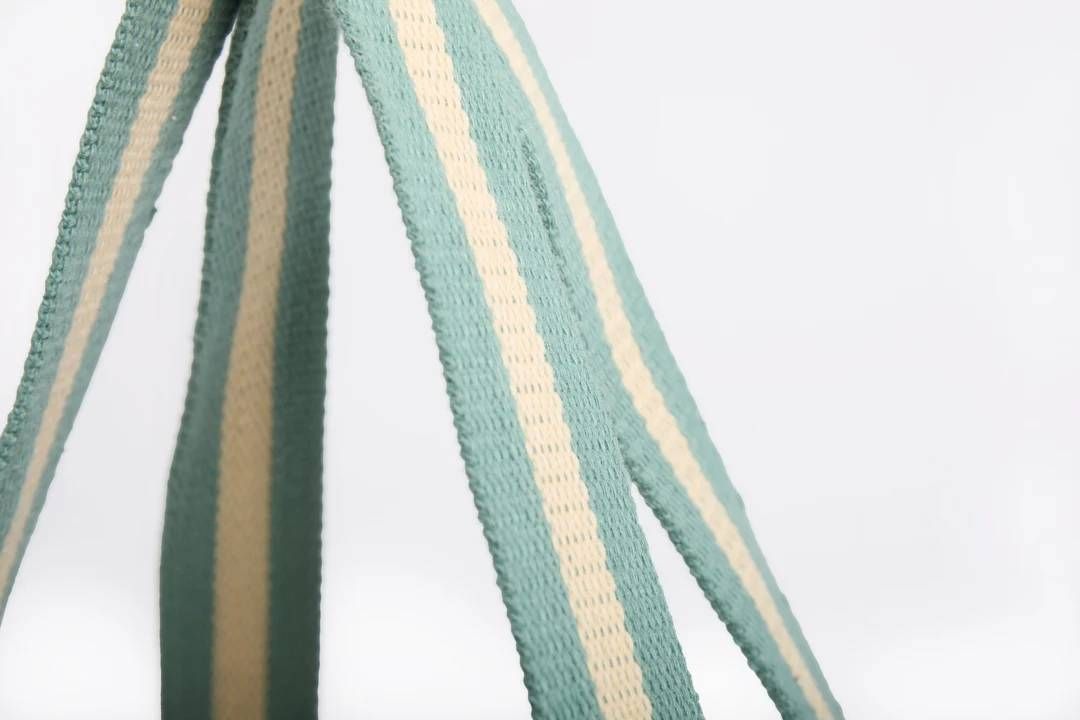 Striped fabric straps with green and beige stripes