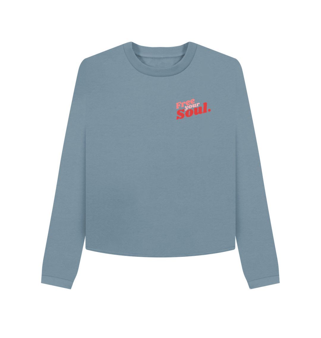 Light blue sweatshirt with "Free Your Soul" text