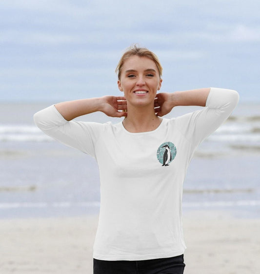 White long-sleeved t-shirt with penguin graphic (person)