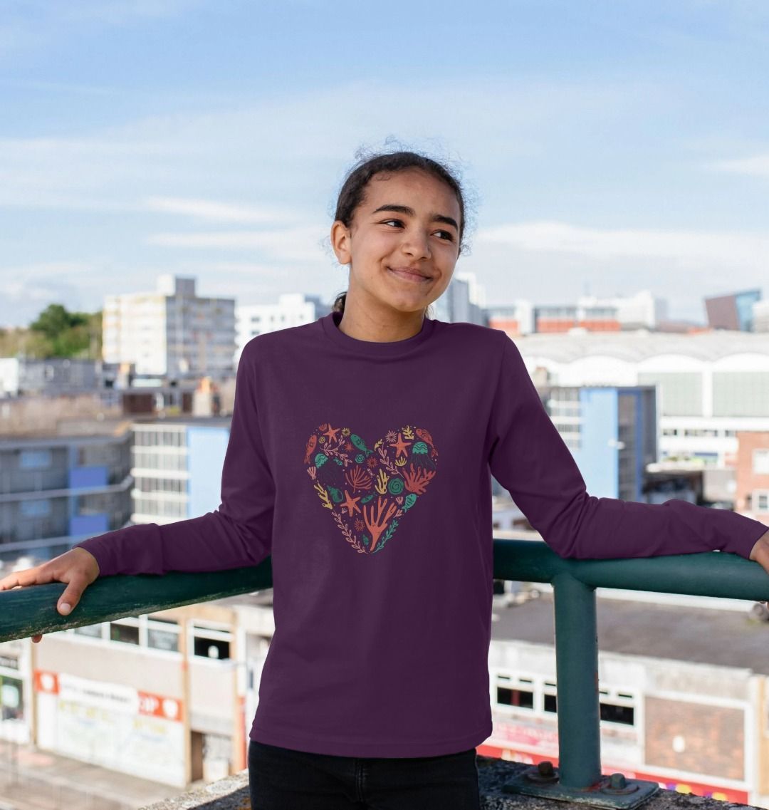 Purple long-sleeved t-shirt with heart design (person)