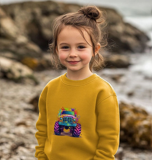 Yellow sweatshirt with colorful monster truck design (person)