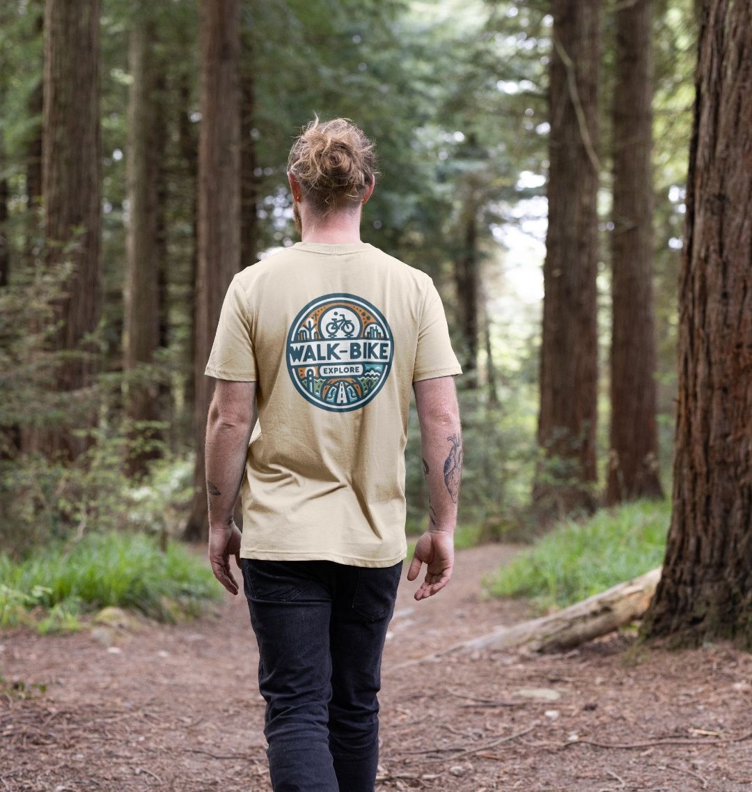 Beige t-shirt with "WALK-BIKE EXPLORE" logo (person)