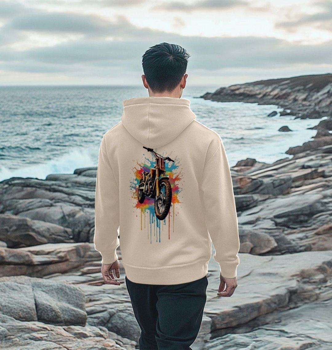 Beige hoodie with colorful motorcycle graphic (person)