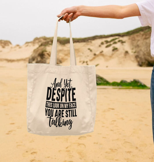 White tote bag with text design (person)