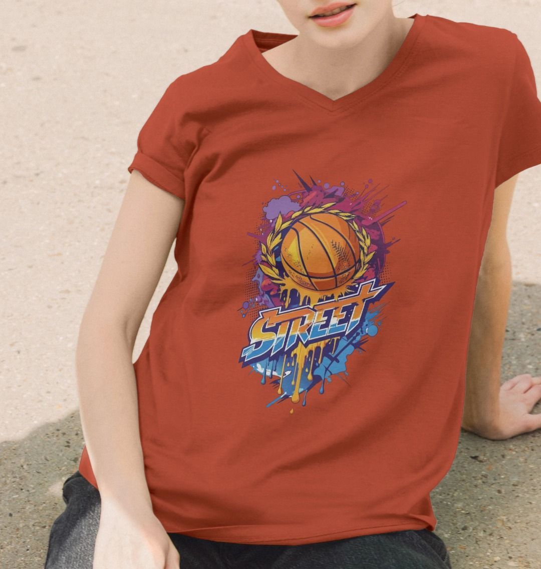 Orange t-shirt with basketball graphic (person)