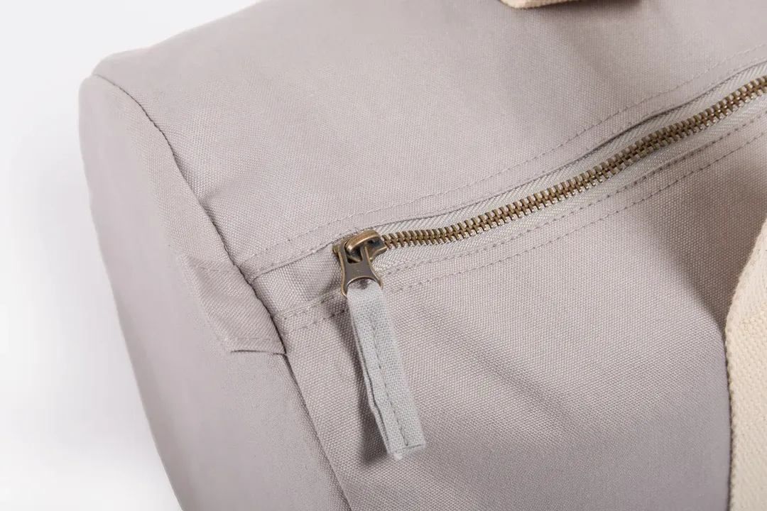 Gray fabric bag with zipper