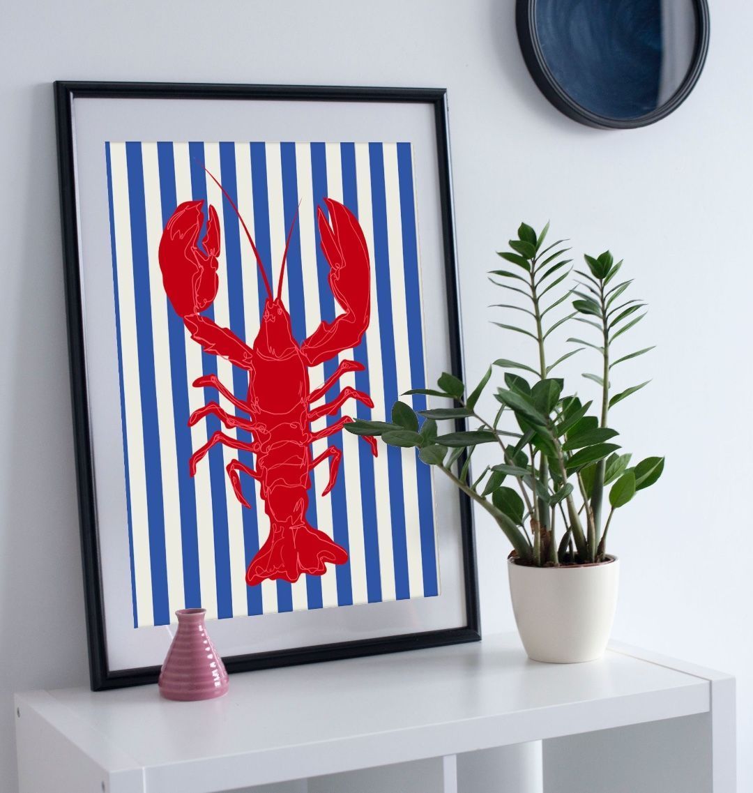 Framed lobster print on striped background