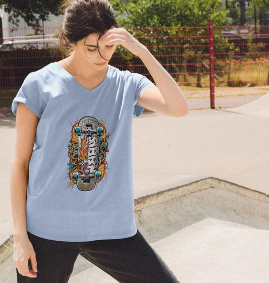 Light blue t-shirt with skateboard graphic (person)
