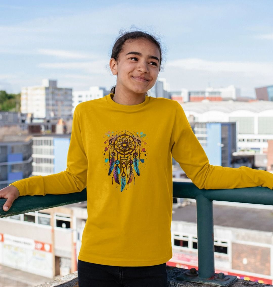 Yellow long-sleeved t-shirt with dreamcatcher design (person)