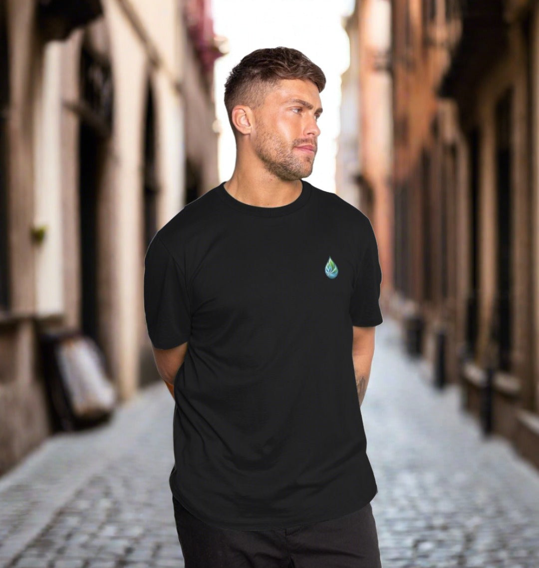 Black t-shirt with small green leaf logo (person)
