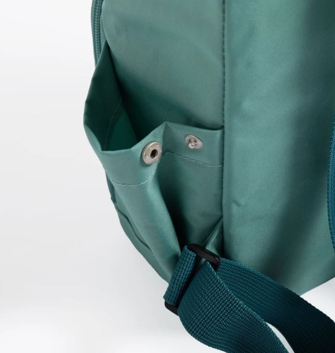 Teal backpack with adjustable strap