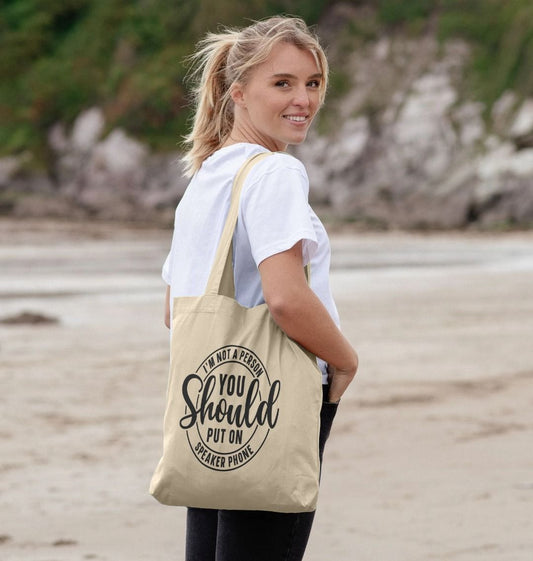 Natural cotton tote bag with text design (person)