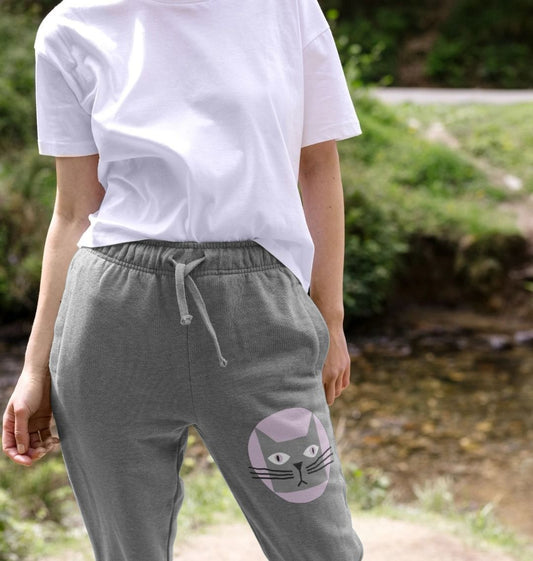 Gray sweatpants with cat face design (person)