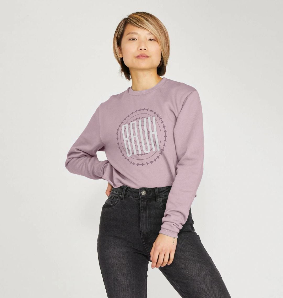 Purple sweatshirt with "BRUH" graphic (person)